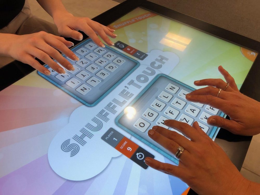 Hands playing Shuffle’Touch together
